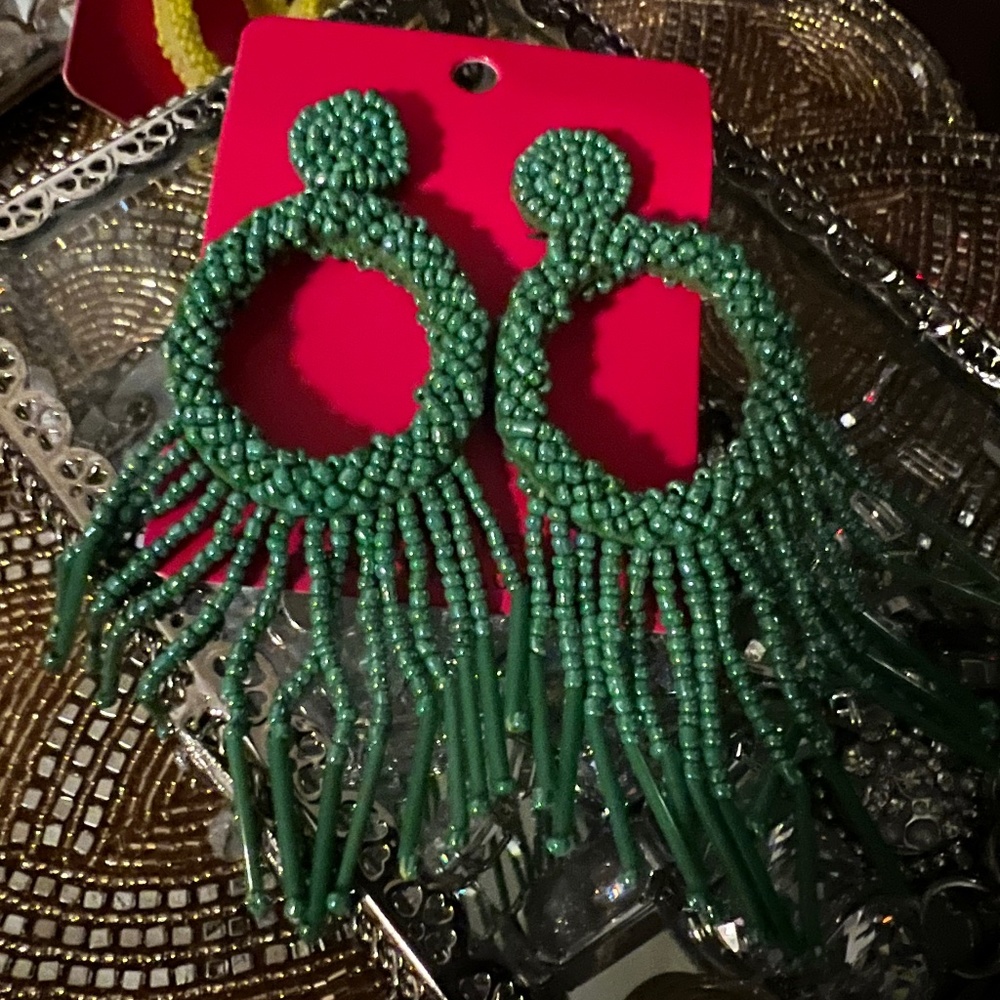 Green beaded statement earrings
